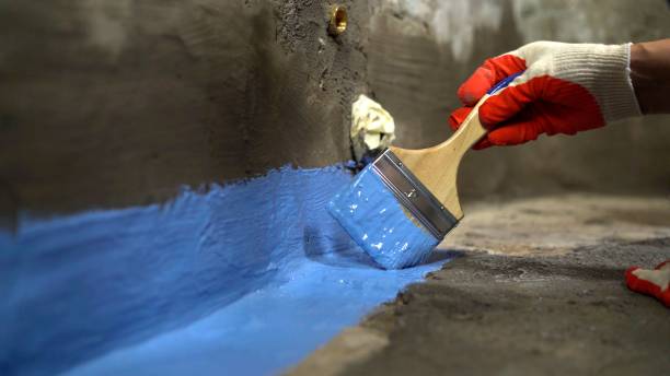 SJ Waterproofing Pros commercial waterproofing team near Robbins, TN